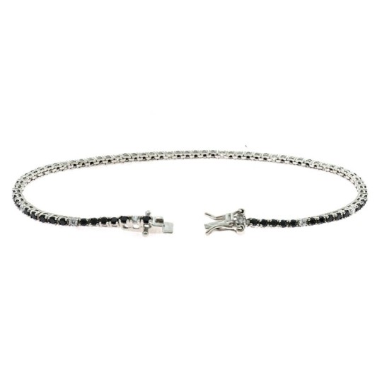 White gold plated tennis bracelet with 5 black and 1 white zircons of 2 mm. in 925 silver