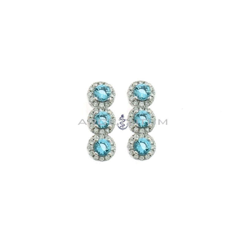 Lobe earrings with blue zircons in white gold plated white zircon frames in 925 silver