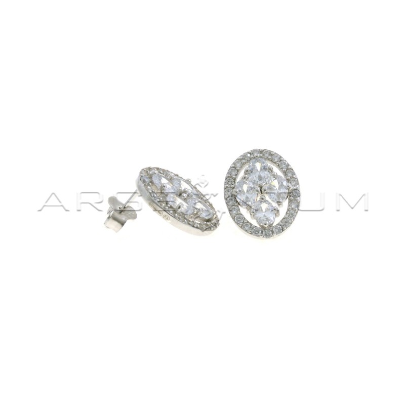 White gold-plated oval-shaped lobe earrings with white gold plated central zircons in 925 silver