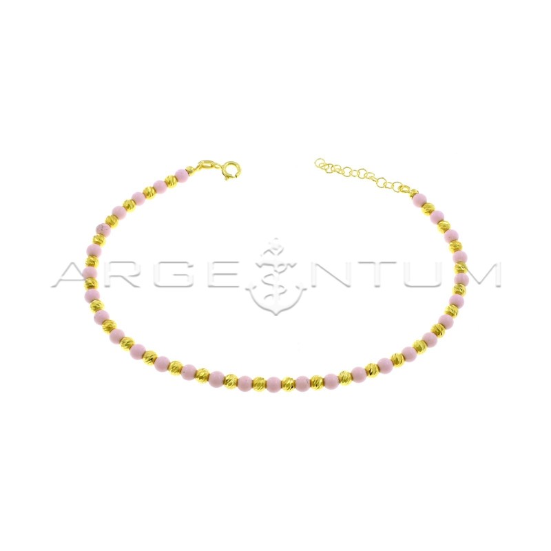 Anklet with diamond spheres and spheres in pink coral paste, yellow gold plated in 925 silver