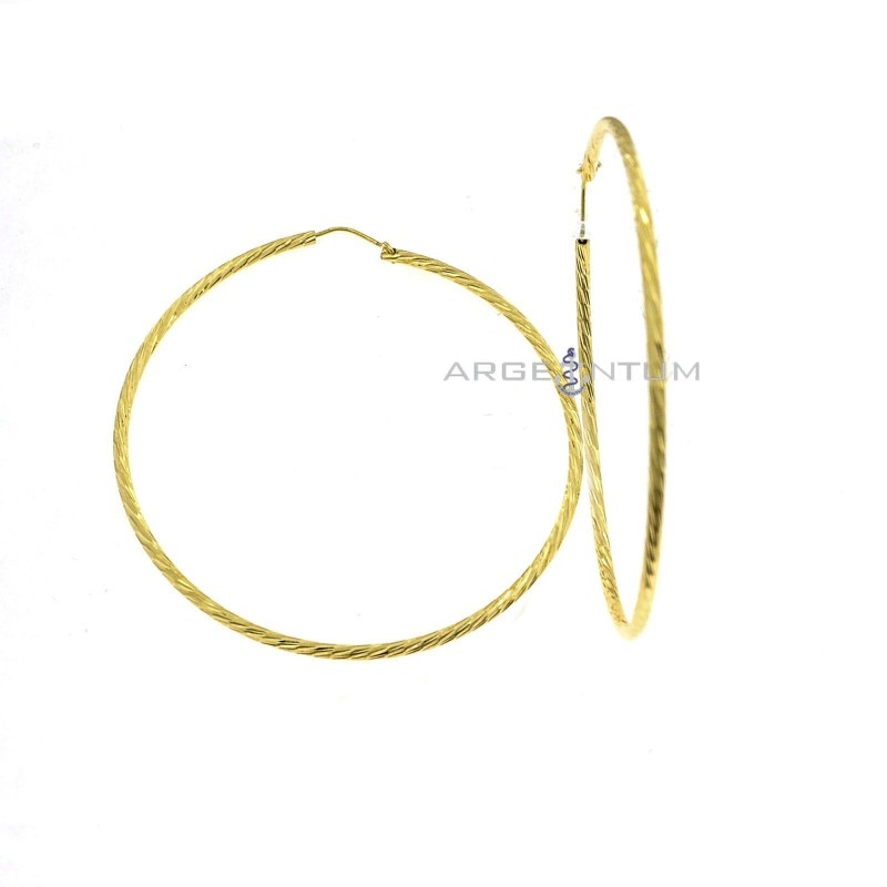 Orecchini cerchio diamantato trasversale ø 65 mm. placcati oro giallo in argento 925