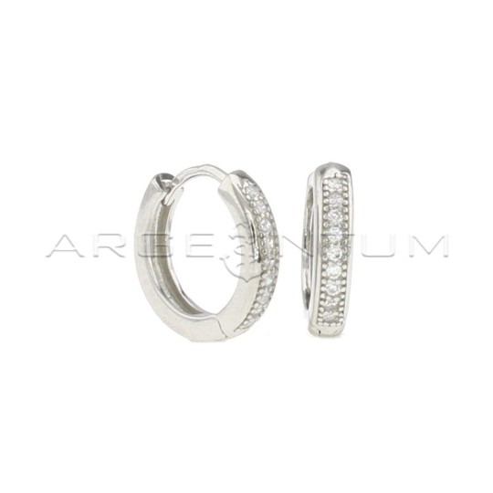 White semi-zircon hoop earrings with white gold plated snap clasp in 925 silver