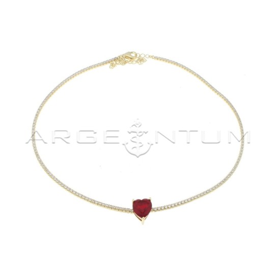 Tennis necklace with white zircons and central red zircon heart yellow gold plated in 925 silver