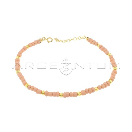 Anklet with powder pink resin tubes and yellow gold plated diamond spheres in 925 silver