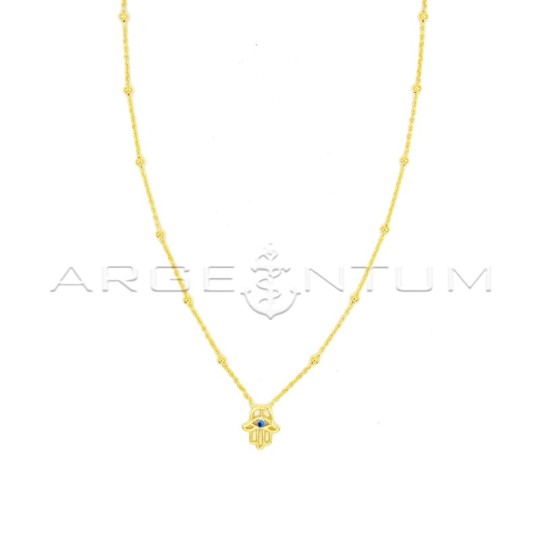 Alternating ball mesh necklace with perforated central hand and blue and black enameled eye, yellow gold plated in 925 silver