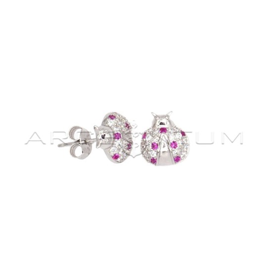 White half-circle ladybug stud earrings with red points of light and white gold plated snap attachment in 925 silver