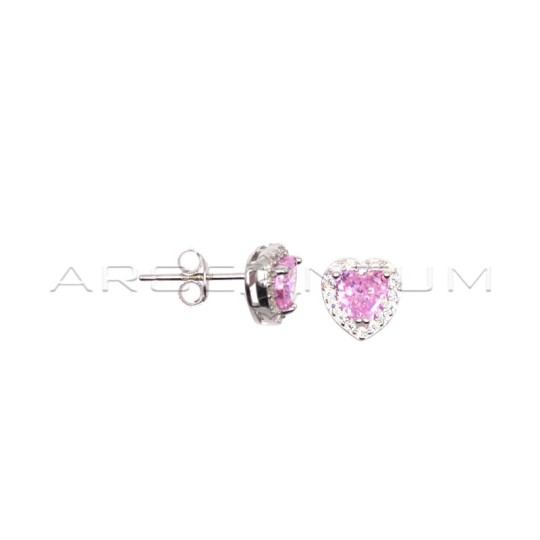 Stud earrings with central pink heart zircon in a frame of white zircons plated white gold in 925 silver