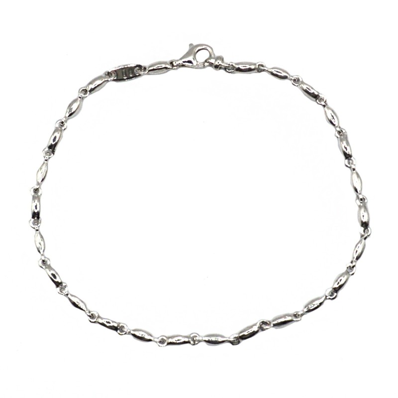 Semi-rigid bracelet with attached...