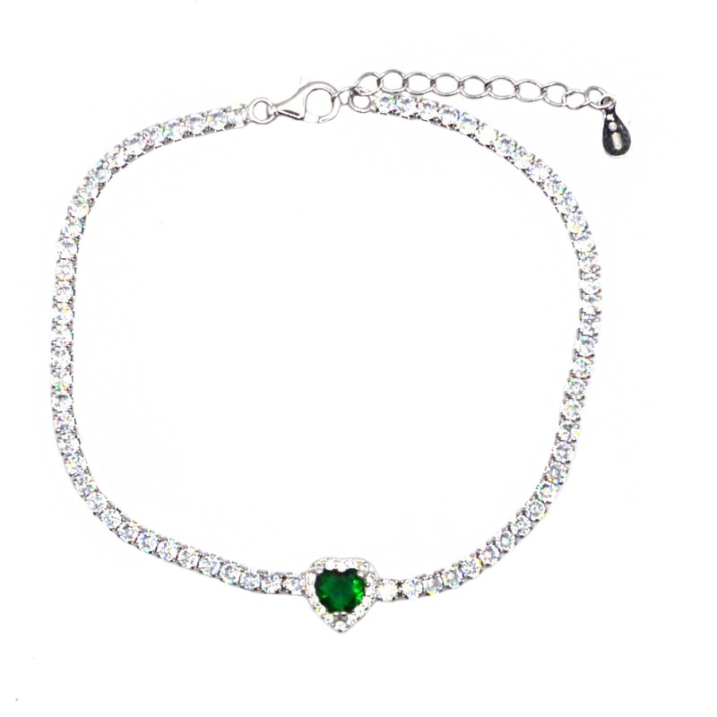 Tennis bracelet with central green...