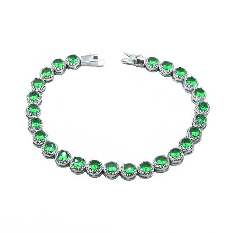 Bracelet with round green zircons in...