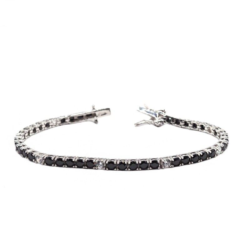 Tennis bracelet with 5 black and 1...