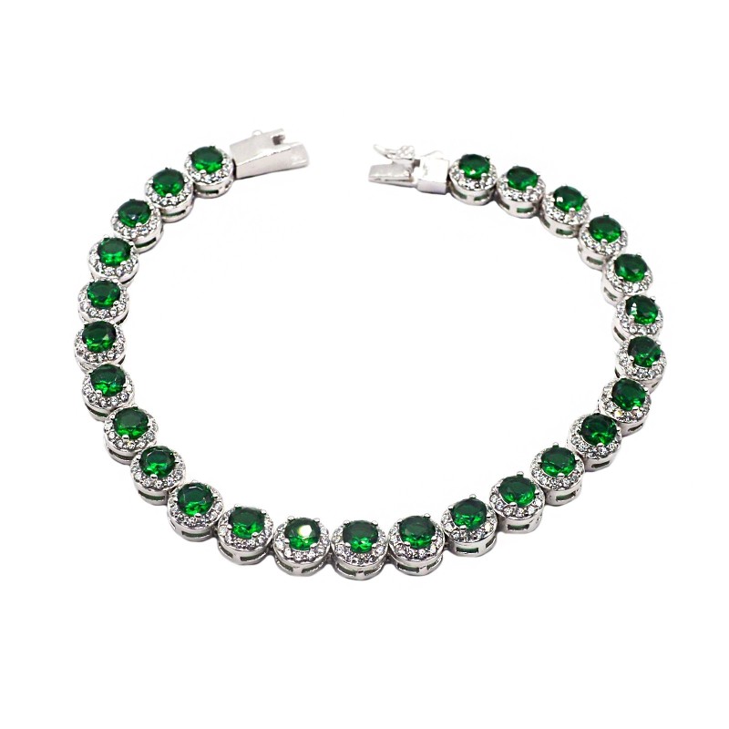 Bracelet of round green zircons in a...