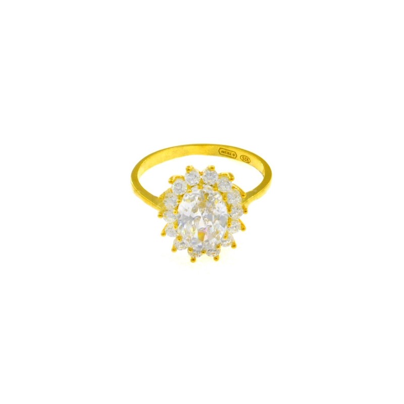 Ring with central white oval zircon...