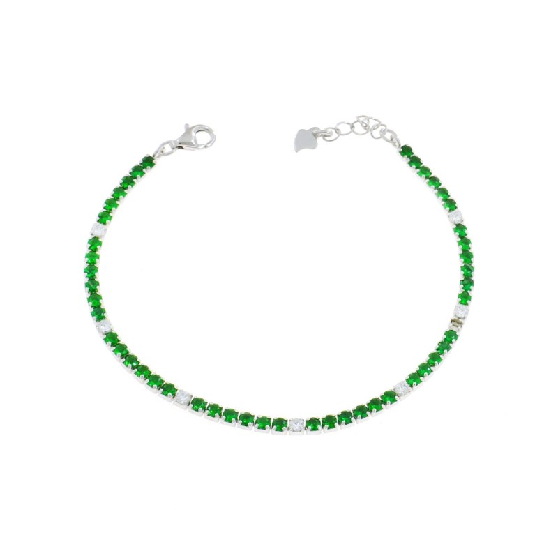 Tennis bracelet with 6 green and 1...